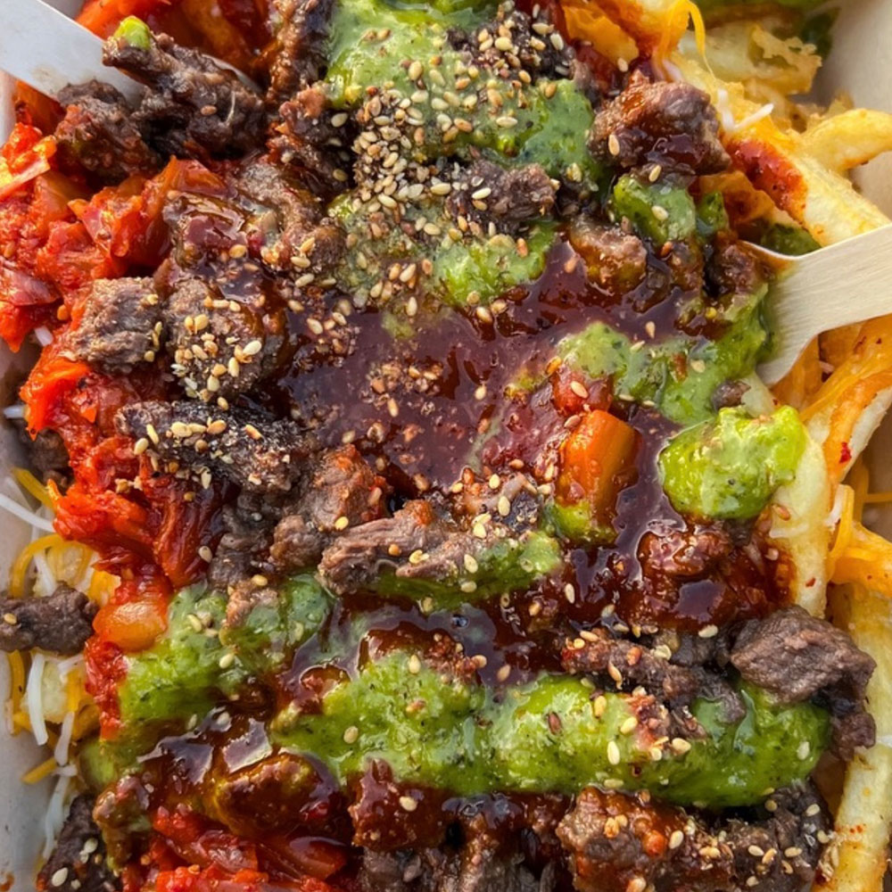 Kogi loaded french fries with meat and sauces