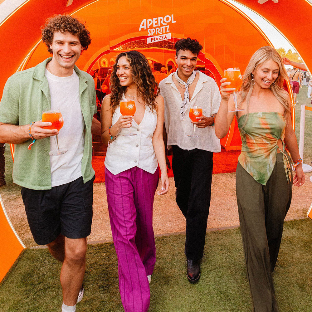 Festival attendees enjoying Aperol beverages