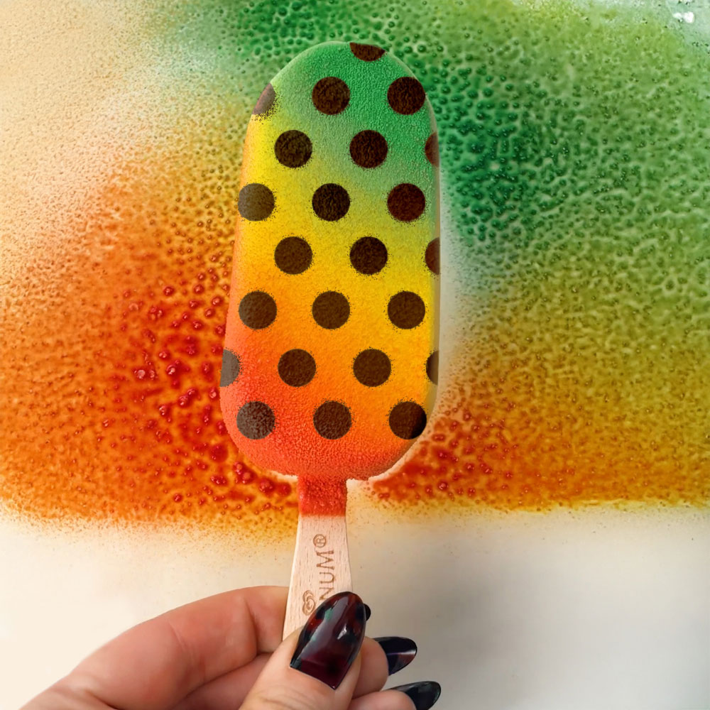 Red, yellow, green, polka dotted ice cream bar