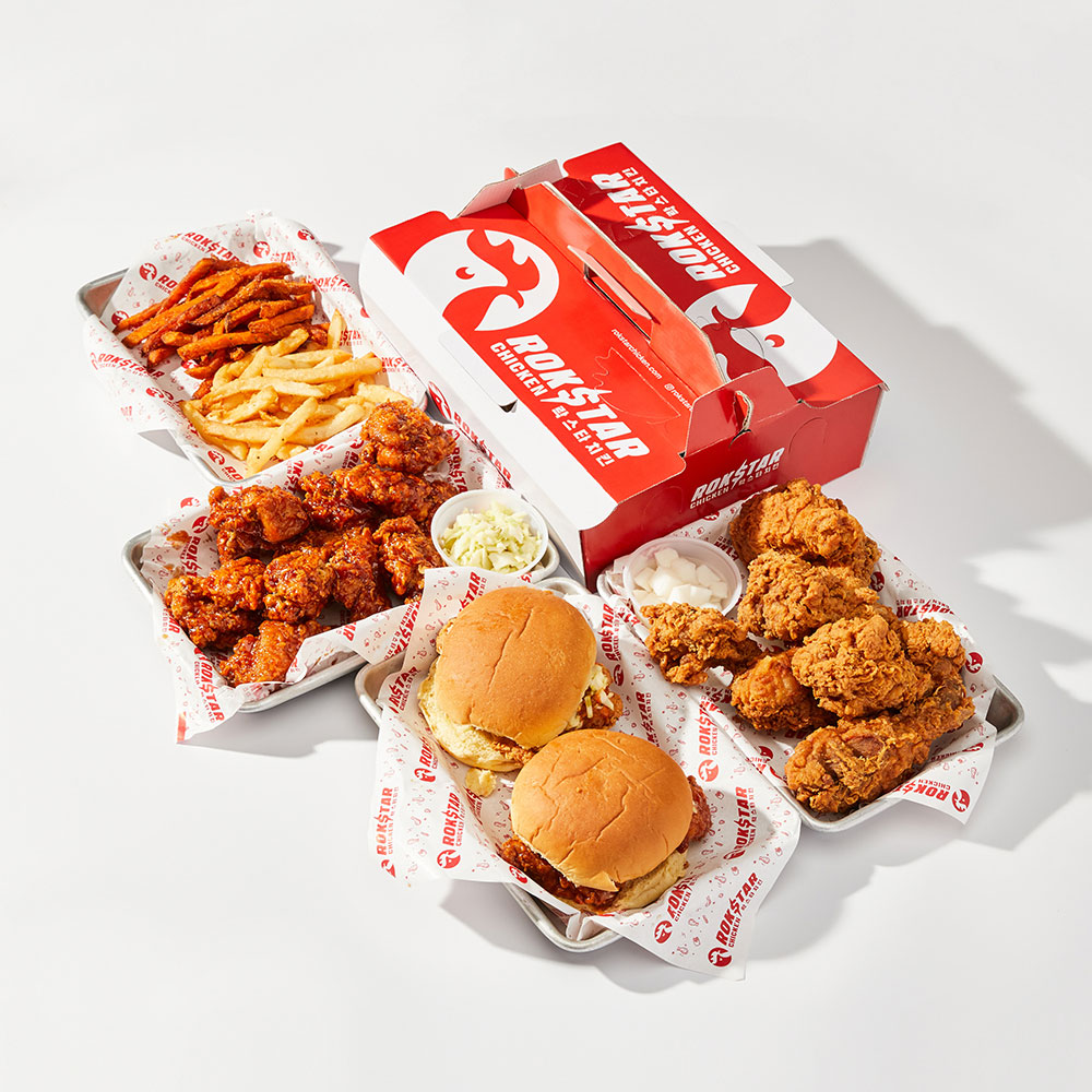 Fried chicken wings and sandwiches with fries